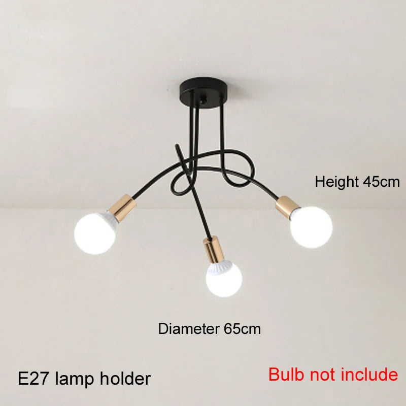 suspension lumineuse moderne noir doré ampoules blanches structure spirale fixation câbles métallique