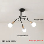 suspension lumineuse moderne noir doré ampoules blanches structure spirale fixation câbles métallique