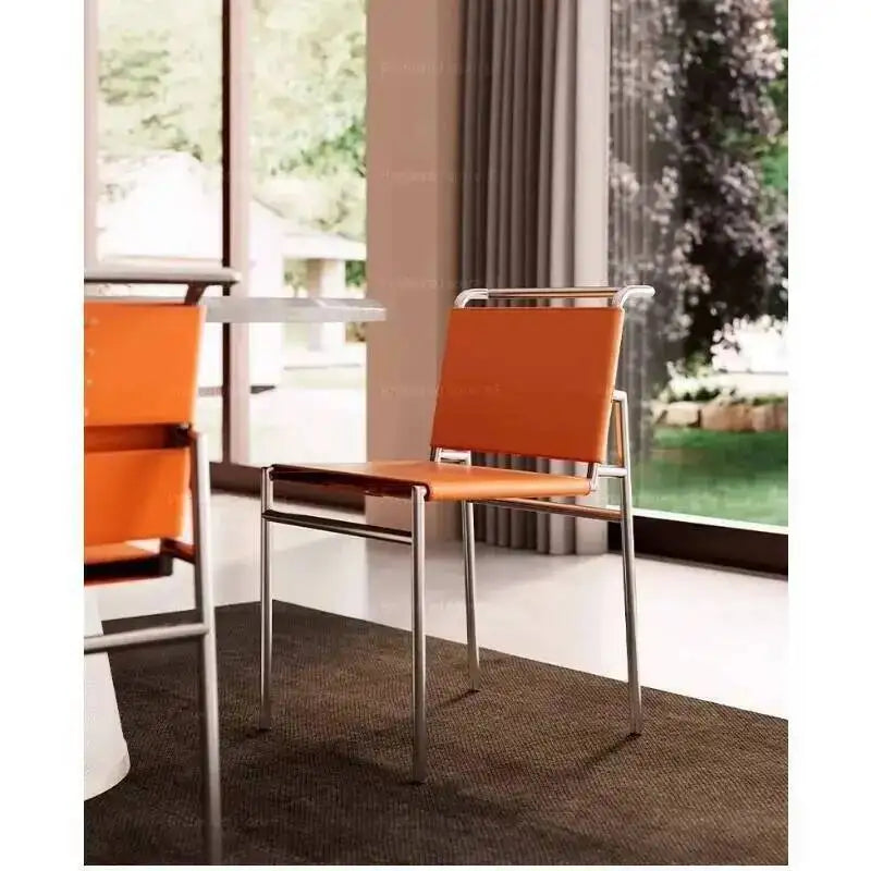 chaise moderne cuir couleur orange noir blanc tringles chromées contemporaine