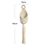 panier suspendu boho motifs géométriques pompon coton anneaux bois