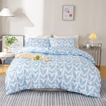 ensemble literie housse couette deux taies d'oreiller coeur gris blanc moderne