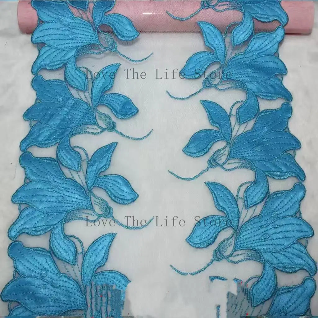 ruban décoratif brodé feuilles stylisées vert violet bleu rose noir 100 polyester 25cm 20yards