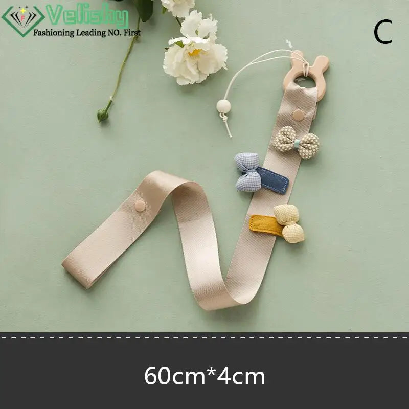 porte accessoires mural moderne rubans clips cheveux motifs floraux pois arc ciel nuages papillons