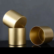 pots vases or surface lisse moderne minimaliste pied métallique éléments décoratifs sable blanc