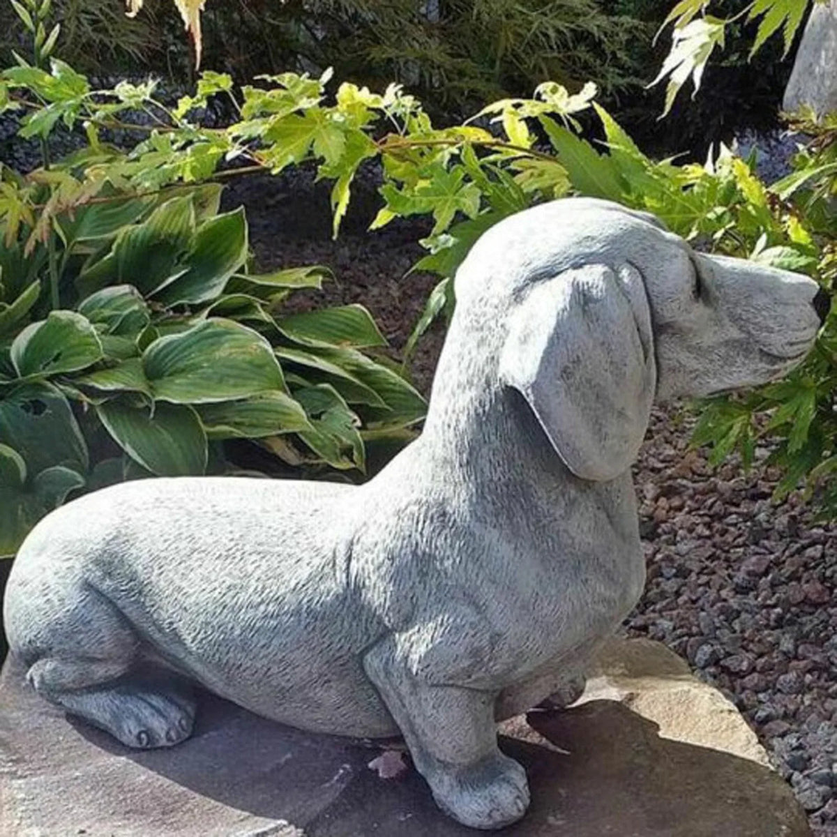 statue chien teckel pierre gris jardin décoration extérieure animaux texturé nature