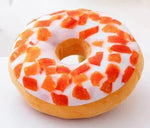 coussin donut forme ronde peluche animée couleurs variées glaçage sucre coloré décoration intérieure sofa