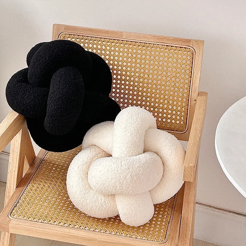 coussin decoratif moderne nœuds complexes couleur vert foncé noir rose beige doux minimaliste salon