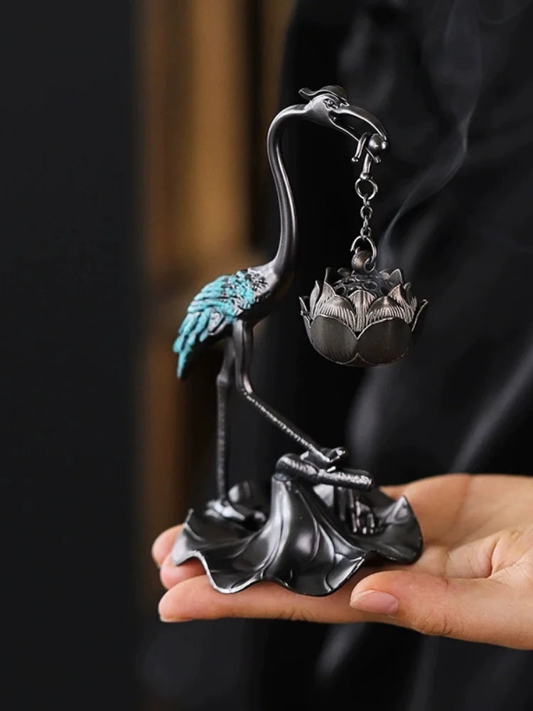 statuette oiseau or noir bleu artisanal élégant décoration maison motif floral support métal