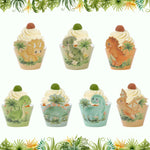 supports cupcakes dinosaures palmiers happy birthday assiettes gobelets sacs cadeaux vert orange blanc enfants