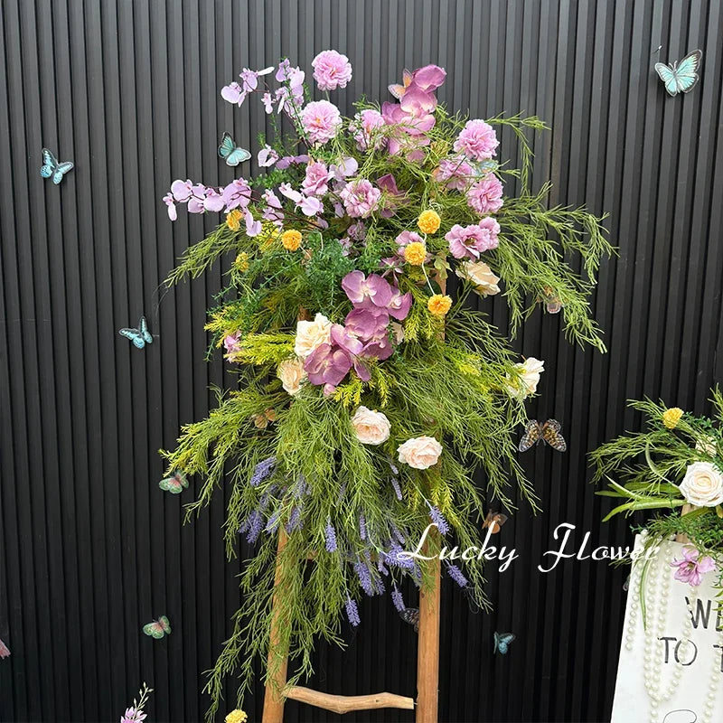 décoration murale naturelle composition florale variée couleurs vives rustique bienvenue mariage