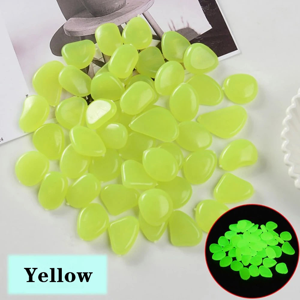 pierres fluorescentes bleu vert jaune rose modernes lisses jardin patio décor lumineux