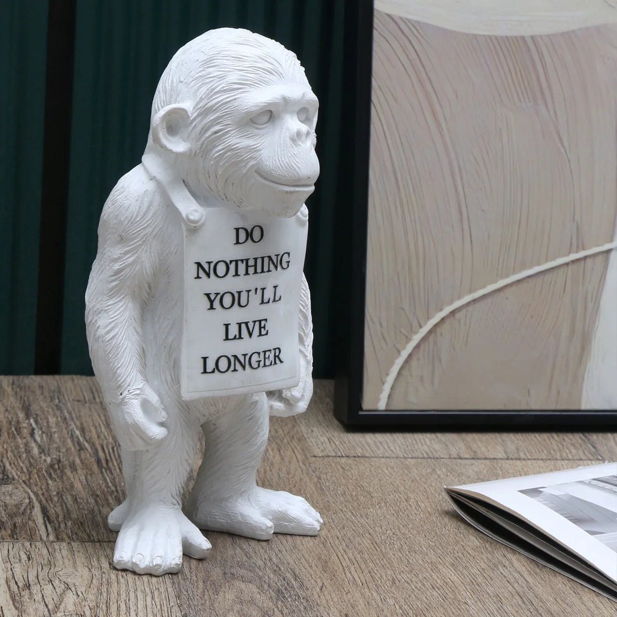 statuette moderne singe résine blanc noir peau texte do nothing vous vivrez plus longtemps
