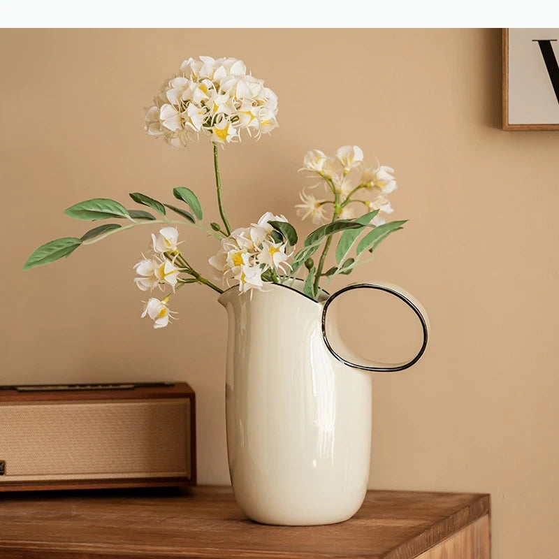 vase moderne céramique beige anse minimaliste élégant décoration intérieure contemporain transporte facilement