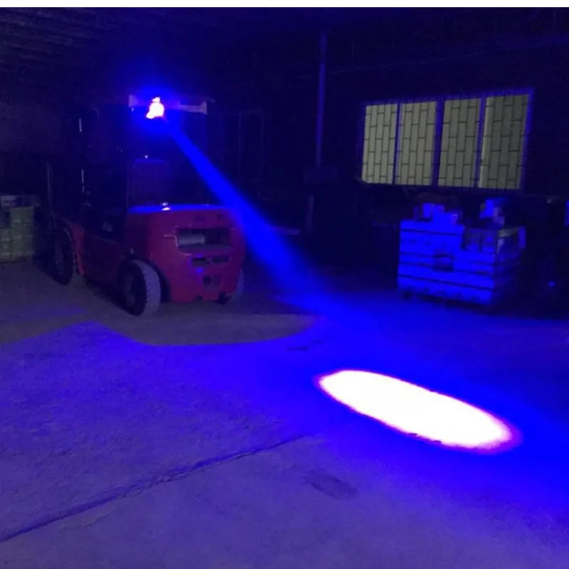projecteur led ovale noir bleu lumière industrielle utilitaire fentes refroidissement support métallique serre joint
