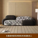 canapé moderne noir blanc fleurs motifs abstraits coussins plateau bois minimaliste italien scandinave
