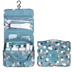 Sac toilette pliable oxford imprimé floral bleu clair motifs blancs roses bleus moderne pratique