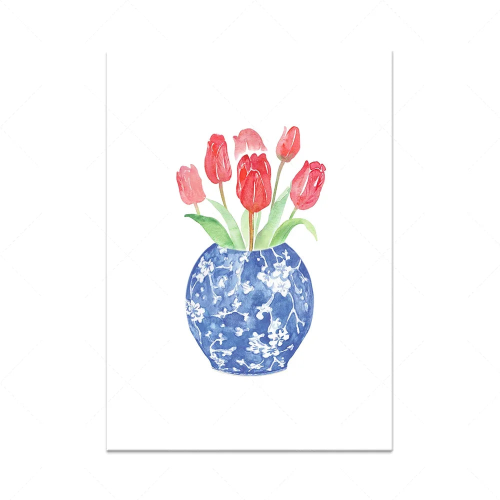 Un bouquet de tulipes rouges épanoui dans un vase décoré de fleurs.