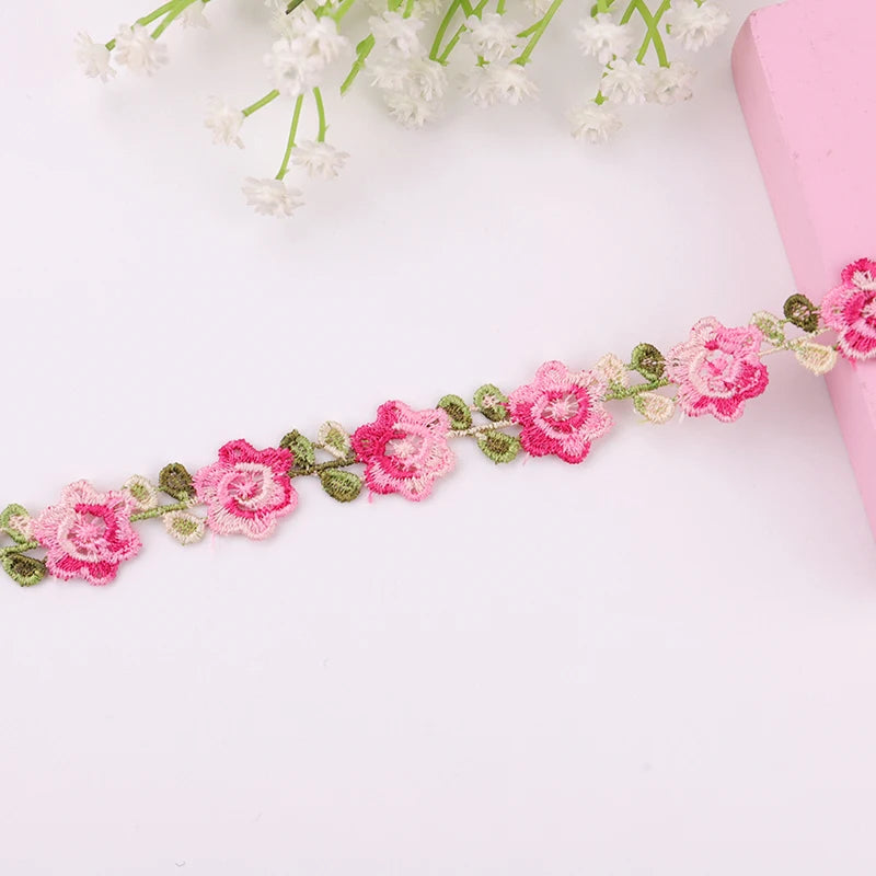 ruban décoratif brodé fleurs rose violet jaune vert polyester largeur cm fleurs brodées opaquet