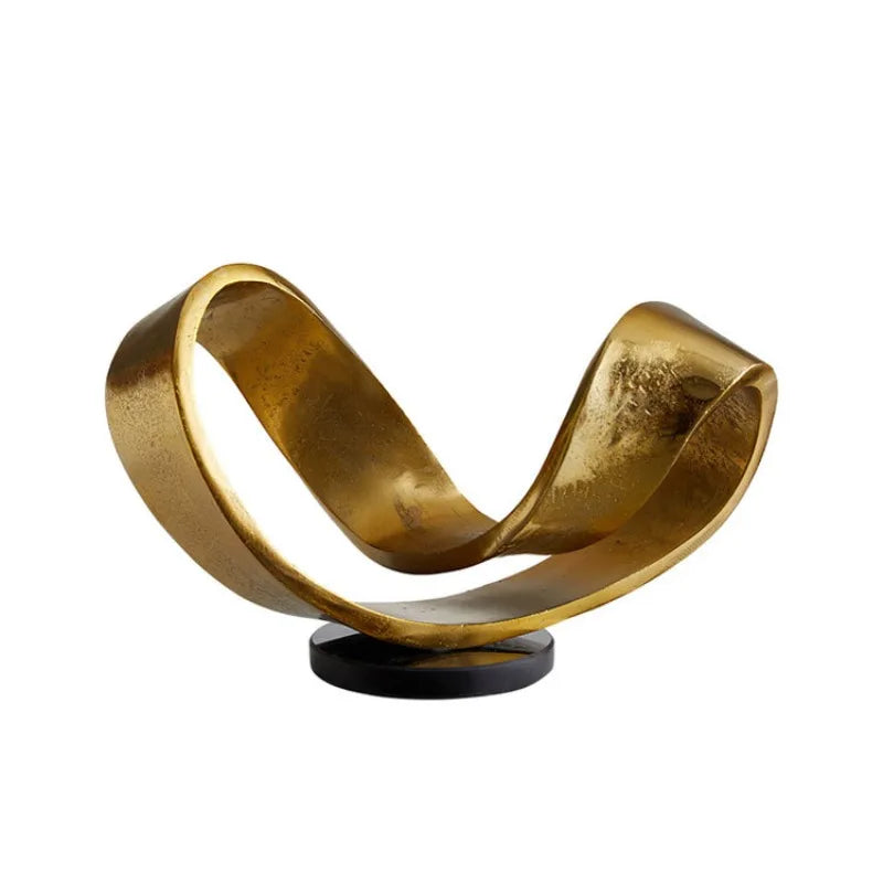 sculpture moderne dorée résine lisse brillante contemporaine abstraite intérieur salon hall entrée decoration