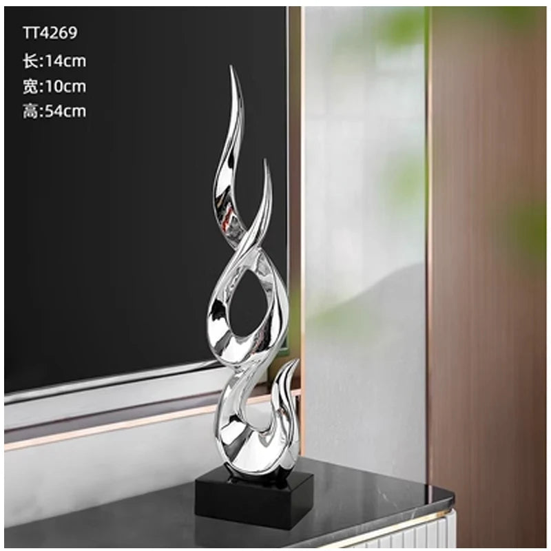 sculpture abstraite moderne rouge or argent noir torsadée fluidesDecoration intérieure résine haute qualité