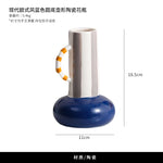 vase décoratif moderne bleu blanc orange lisse texturé géométriquebranches fleurs