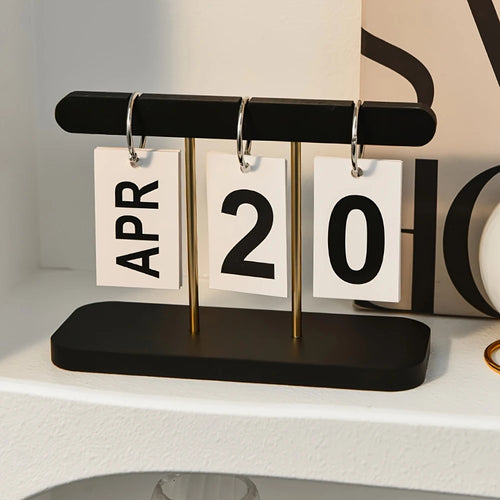 calendrier tournant page moderne noir blanc doré mat opaque jours mois