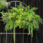 décoration extérieure arche verte feuillage dense naturelle rustique événements anniversaires fêtes mariage