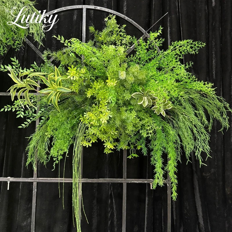 décoration extérieure arche verte feuillage dense naturelle rustique événements anniversaires fêtes mariage