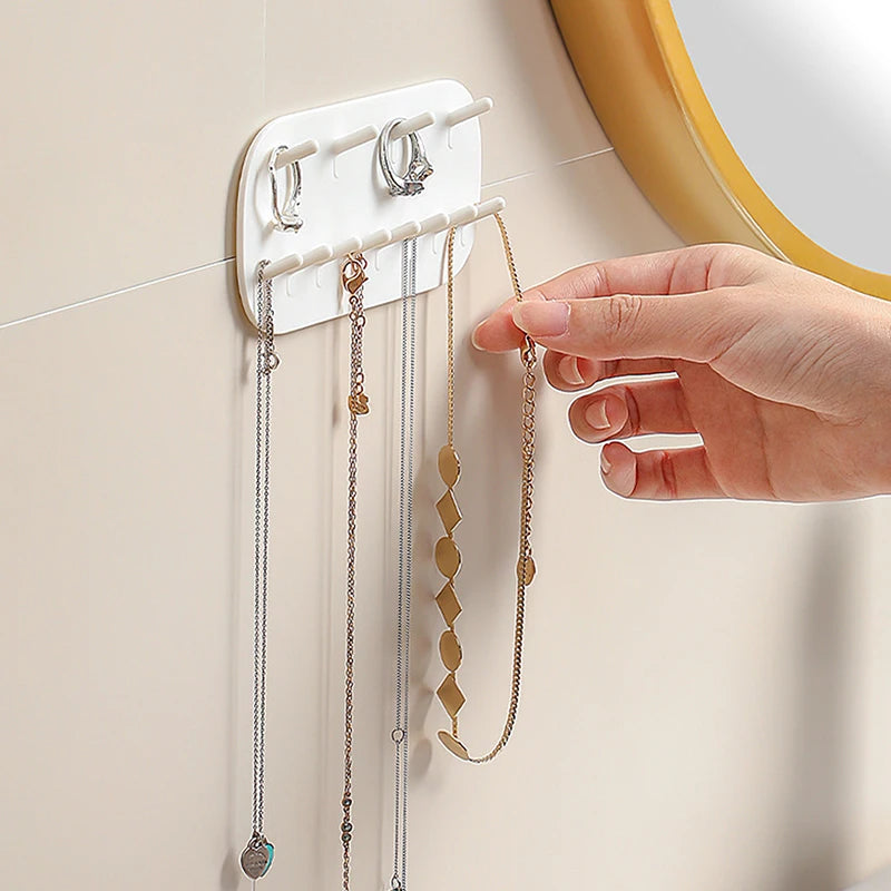 porte bijoux mural blanc moderne adhésif 12 crochets rangement plat lisse