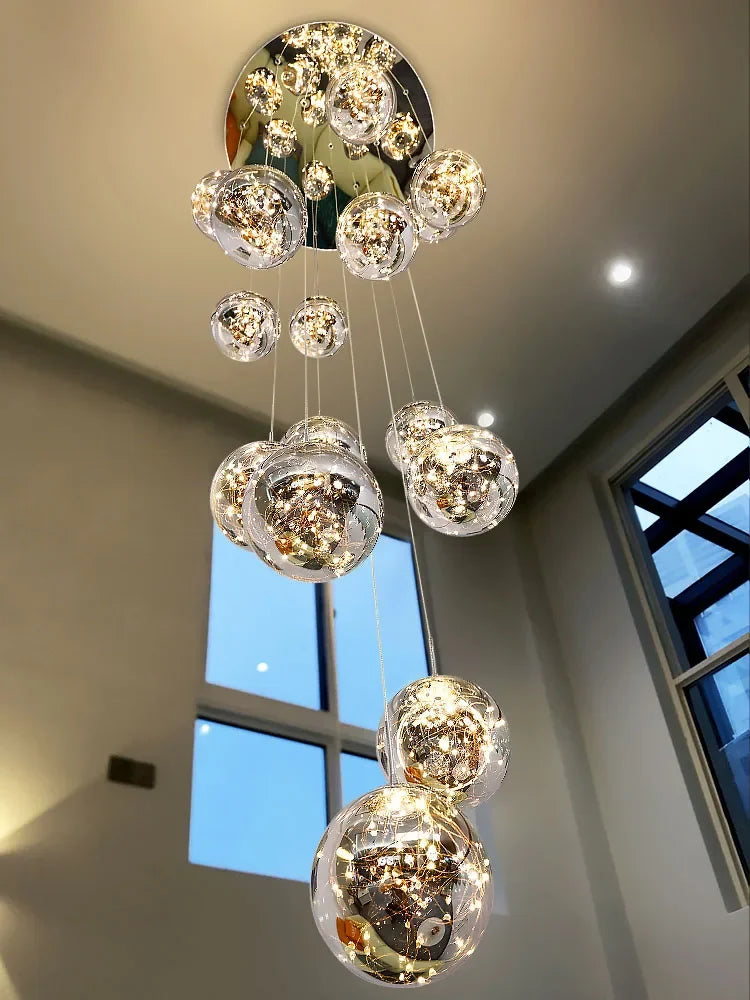 lustre suspension moderne verre transparent brillantes acier argenté luminaire escalier luxe