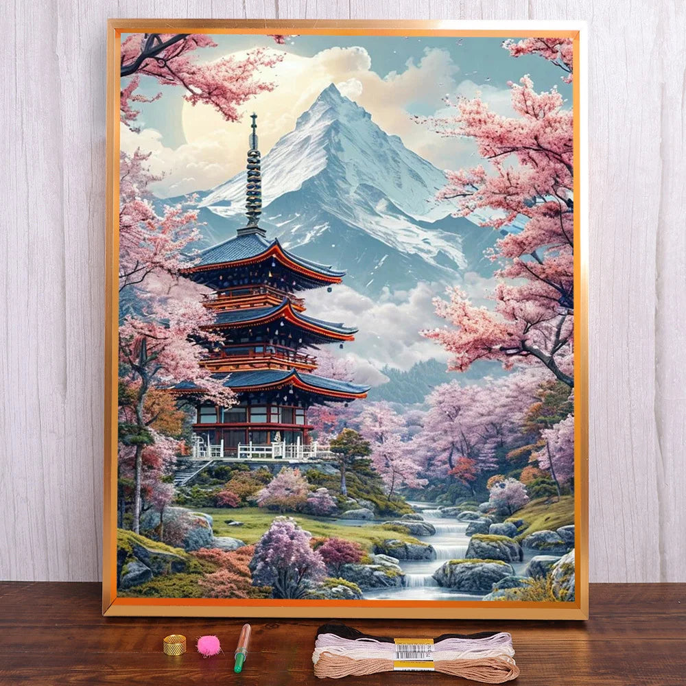tableau paysage japonais pagode fleurs cerisier rivière montagnes broderie coton multicolore traditionnel cadre bois