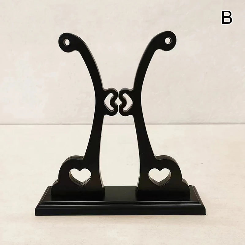 présentation éventail pliant traditionnel rouge rose jaune noir motifs floraux géométriques support bois sculpté