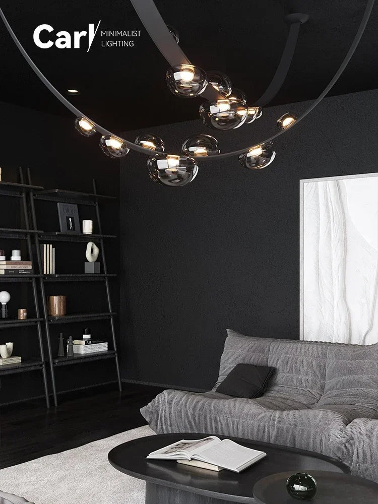 lustre suspension moderne minimaliste noir transparent doré globes organiques chambre salon