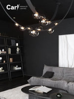 lustre suspension moderne minimaliste noir transparent doré globes organiques chambre salon