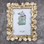 cadre photo ornement feuilles dorées texture métallique vintage fixation photo or antique gold silver