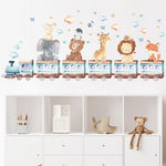Application autocollants sur mur chambre bébé