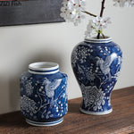 vases bleu blanc fleurs oiseaux feuillage classique decoration table arrangement fleurs moderne