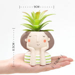 figurines décoratives cartoon fleurs reliefs cheveux stylisés plante succulente verte rose beige