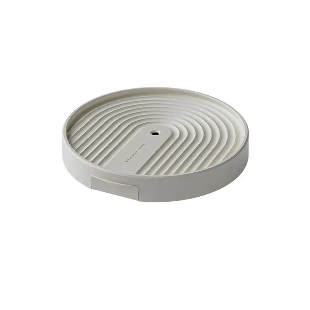 support plante roulettes collecte eau moderne gris clair rayures concentriquesversibleintérieur