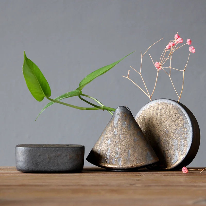 cache plante céramique moderne minimaliste gris métallisé texture marbrée feuille verte branche séchée fleur