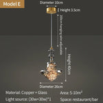suspension lumineuse moderne transparente dorées câble suspendu élégante led trois couleurs chambre principale