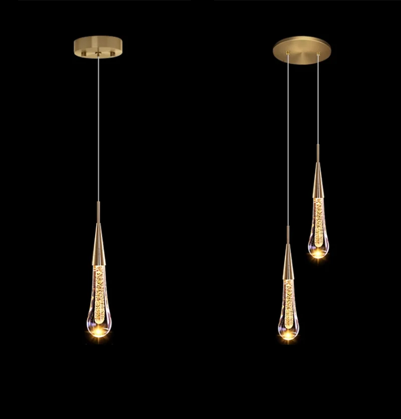 lampe suspendue moderne or noir cristal bulle brillant transparent chambre salon étude