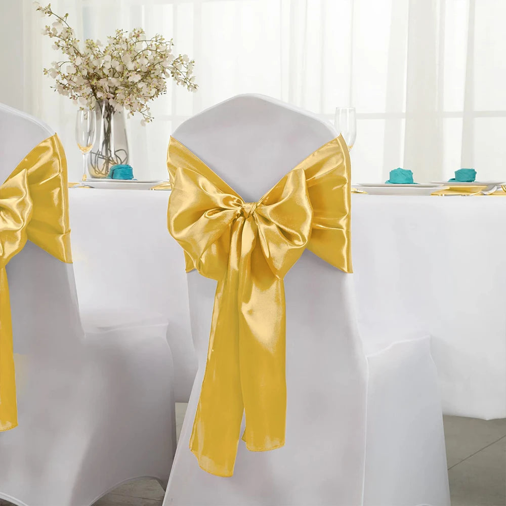 nappe satinée jaune doré blanc turquoise décoration table festive mariage événement spécial rubans décoratifs