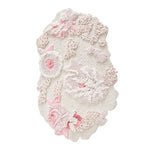 tapis ovale rose motifs floraux texture poilue decoratif maison chambre salon