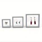 boîtes bijoux transparentes moderne clips vert orange rose bleu gris