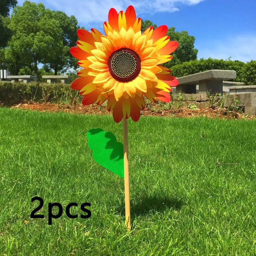 décoration extérieure fleur artificielle jaune rouge bleu vert rayonnante pétale verte tringle jardin cour
