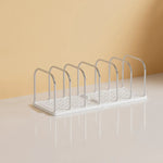 support livres transparent moderne tiroirs poignées lapin blanc grille métal chromé