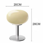 lampe table moderne minimaliste rose pâle beige clair verre dépoli pied métallique base métallique