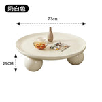 table basse ronde moderne pieds sphériques diamètre 75cm noir blanc cassé tulipes roses fleurs