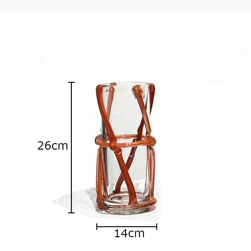 vase moderne transparent tiges entrelacées orange sans fleur